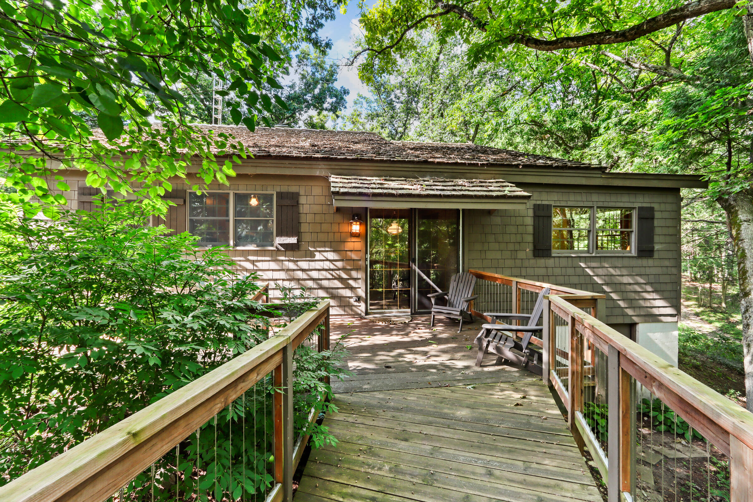 W3895 Timber Lake Road Troy, WI 53120 - Photo 43 of 64 The original Pabst cottage approach on walkway from main house.