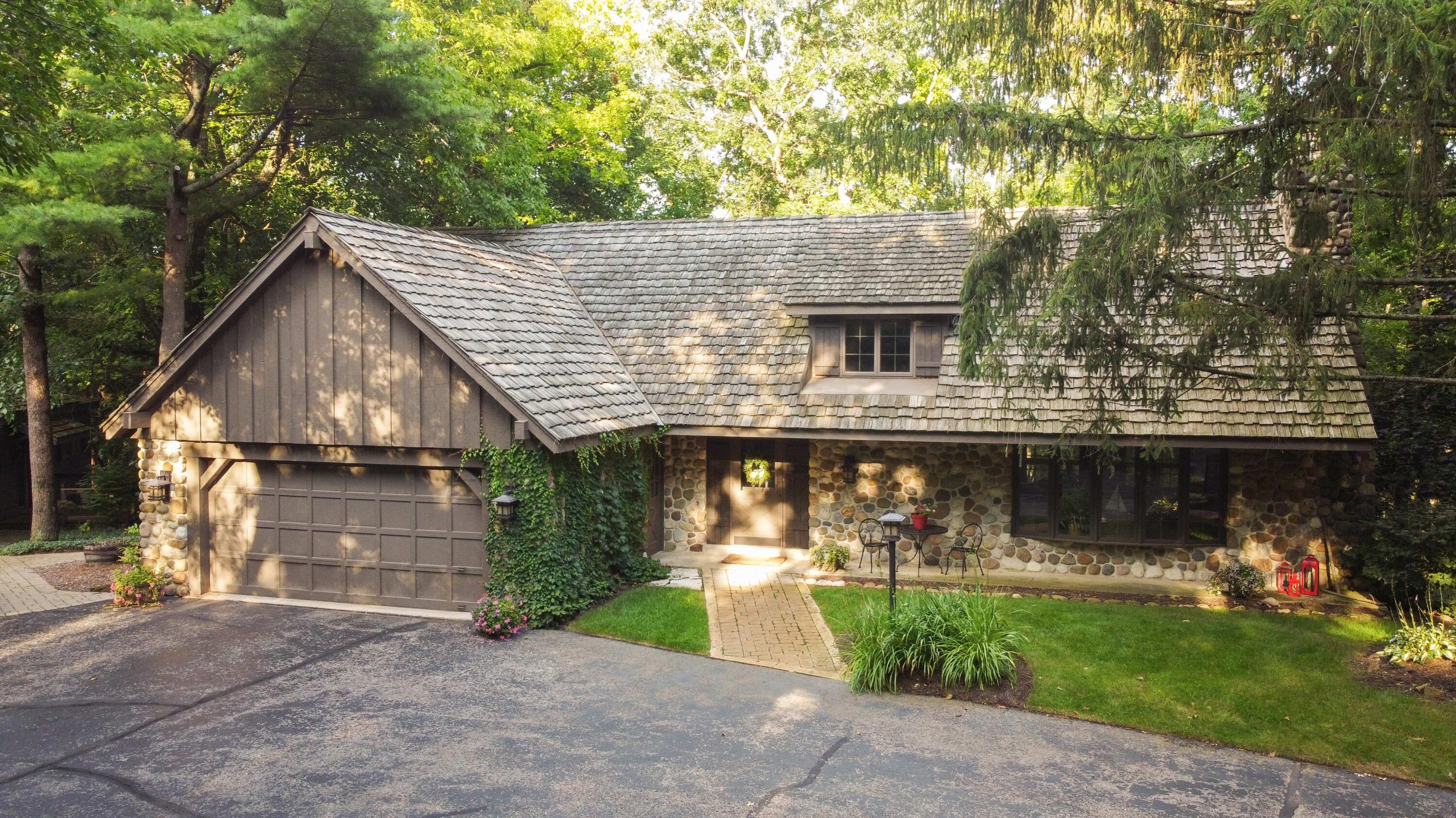 W3895 Timber Lake Road Troy, WI 53120 - Photo 5 of 64 The main house is custom built for its setting on the stunning Kettle Moraine landscape.