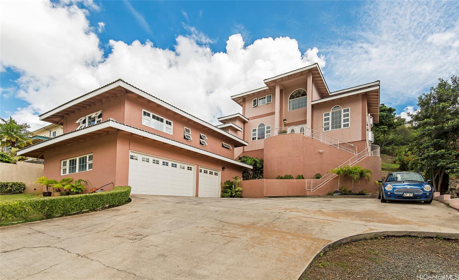 5533 Poola Street Honolulu, HI 96821 - Photo 1 of 1 a front view of a house with a yard