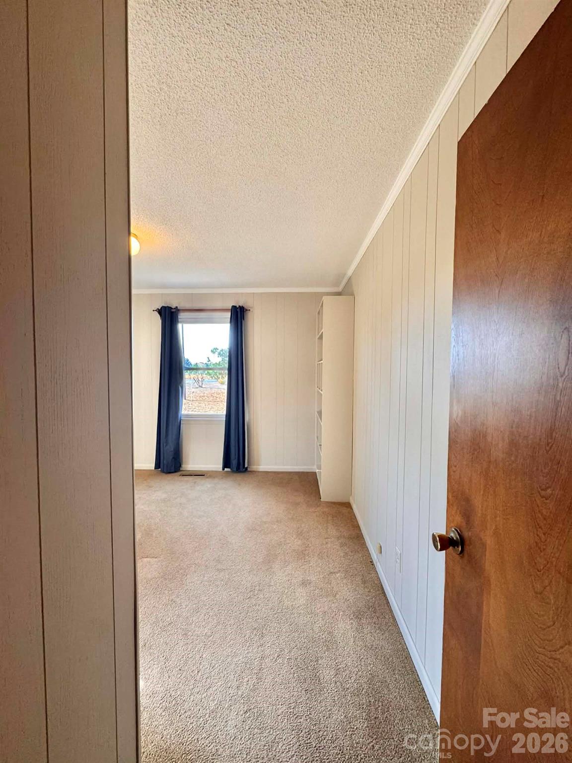 769 Dowd Road Candor, NC 27229 - Photo 16 of 32 a view of an empty room and window