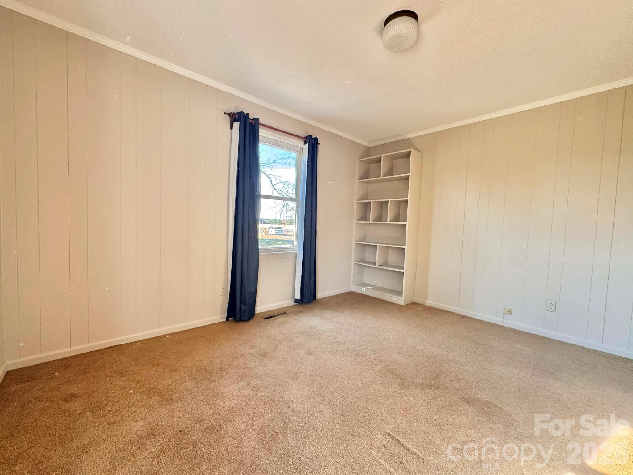 769 Dowd Road Candor, NC 27229 - Photo 18 of 32 an empty room with closet