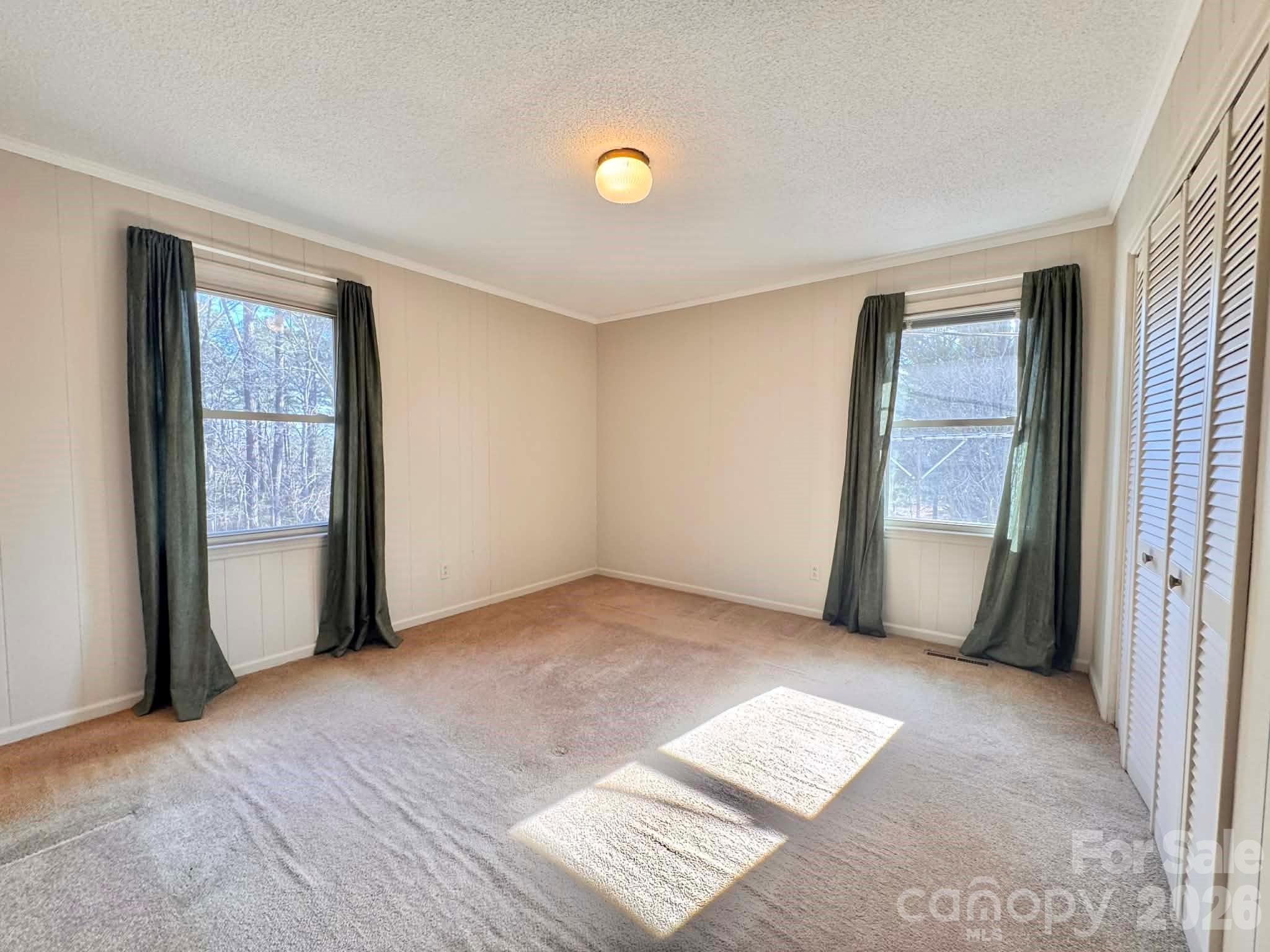 769 Dowd Road Candor, NC 27229 - Photo 20 of 32 a view of an empty room with a window