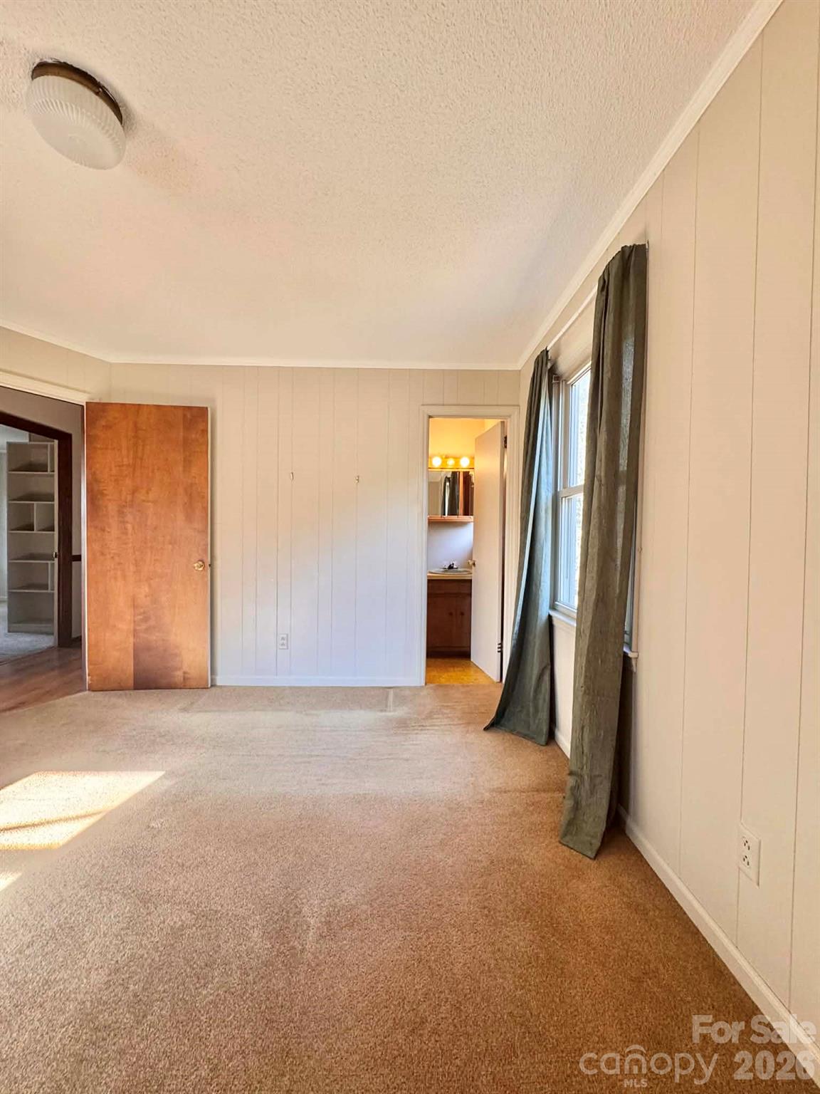 769 Dowd Road Candor, NC 27229 - Photo 22 of 32 an empty room with closet