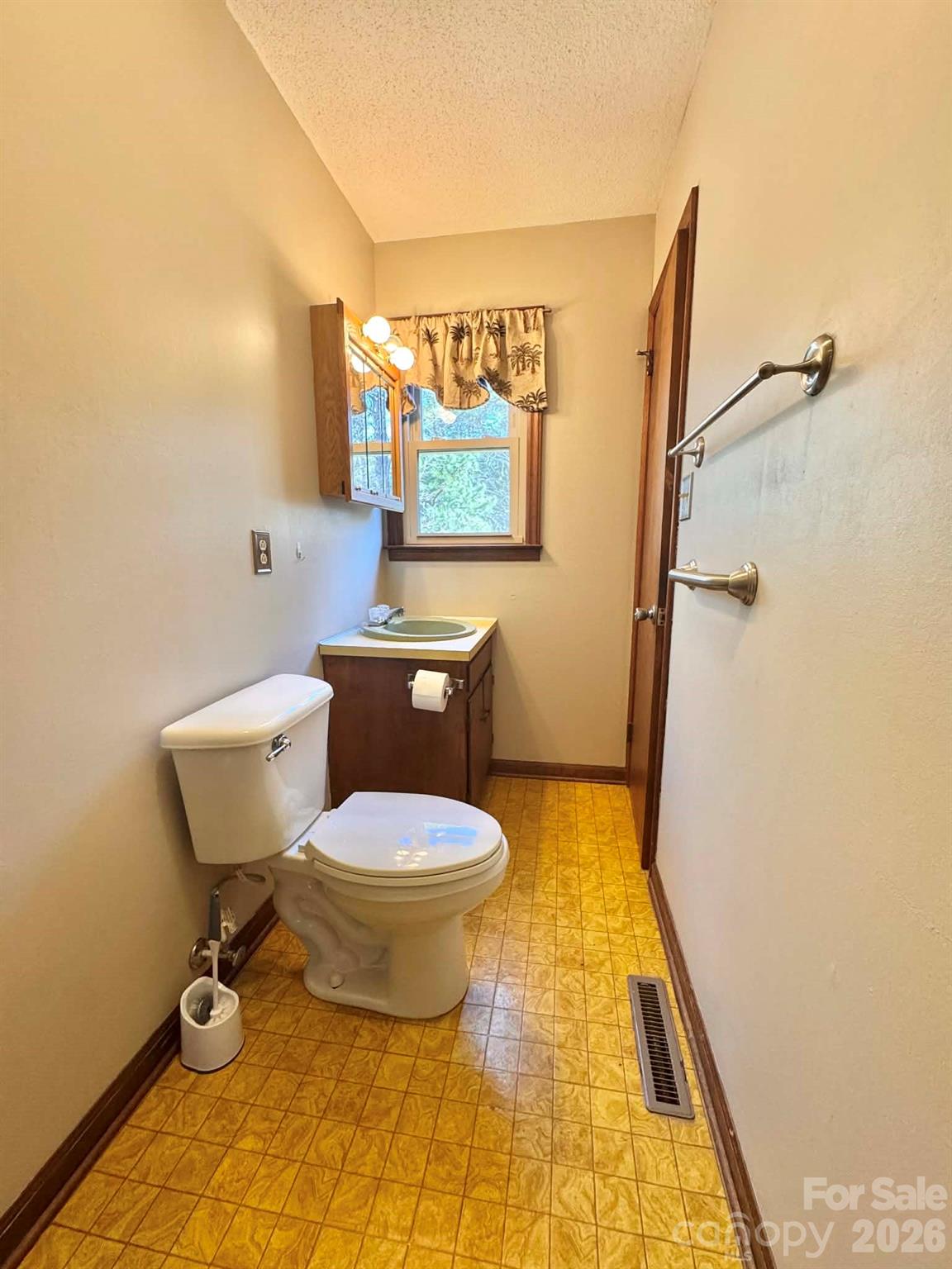 769 Dowd Road Candor, NC 27229 - Photo 23 of 32 a bathroom with a toilet and a shower