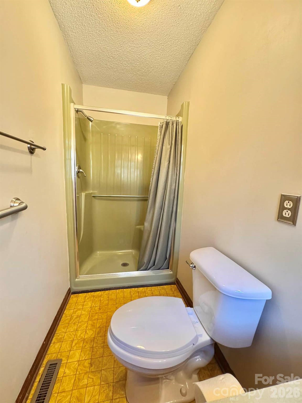 769 Dowd Road Candor, NC 27229 - Photo 24 of 32 a bathroom with a sink and a mirror