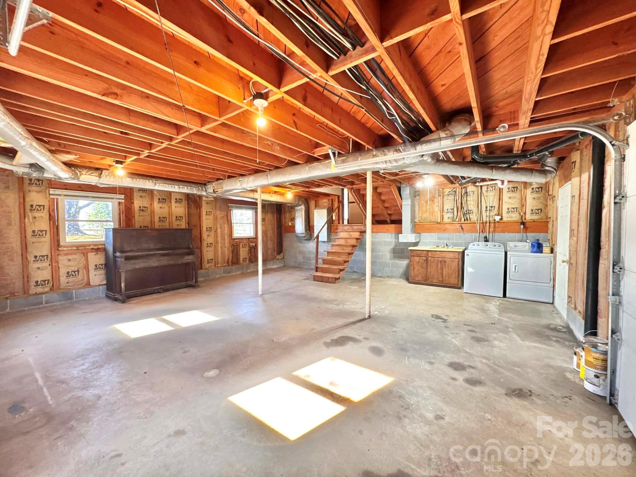 769 Dowd Road Candor, NC 27229 - Photo 26 of 32 a view of empty room with wooden ceiling