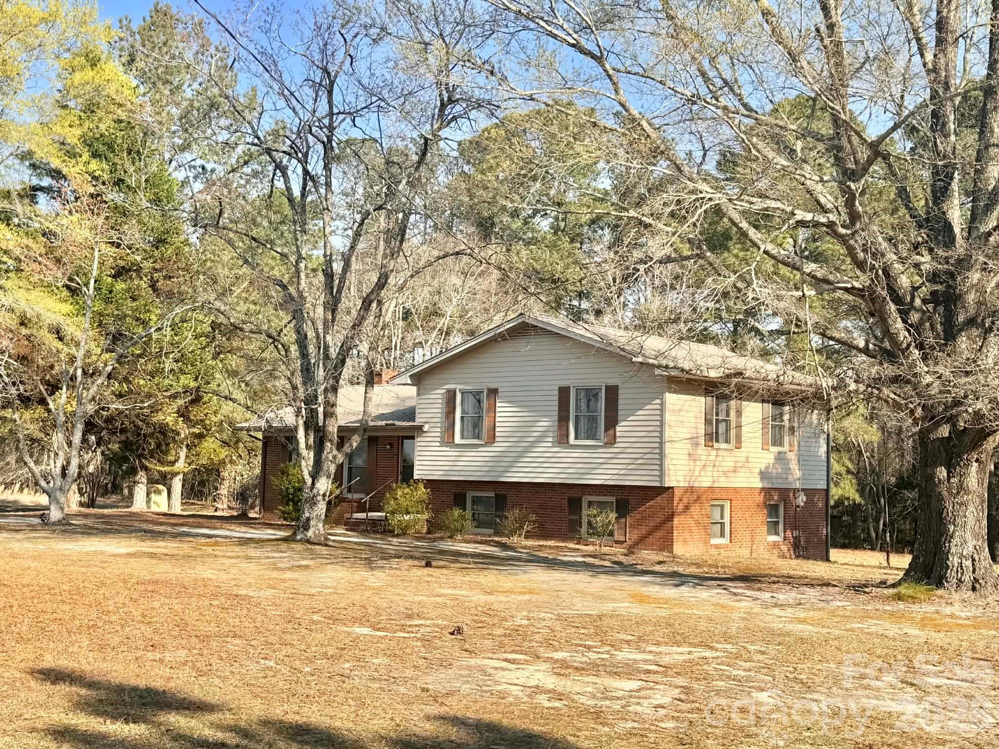 769 Dowd Road Candor, NC 27229 - Photo 29 of 32 a house view with a outdoor space