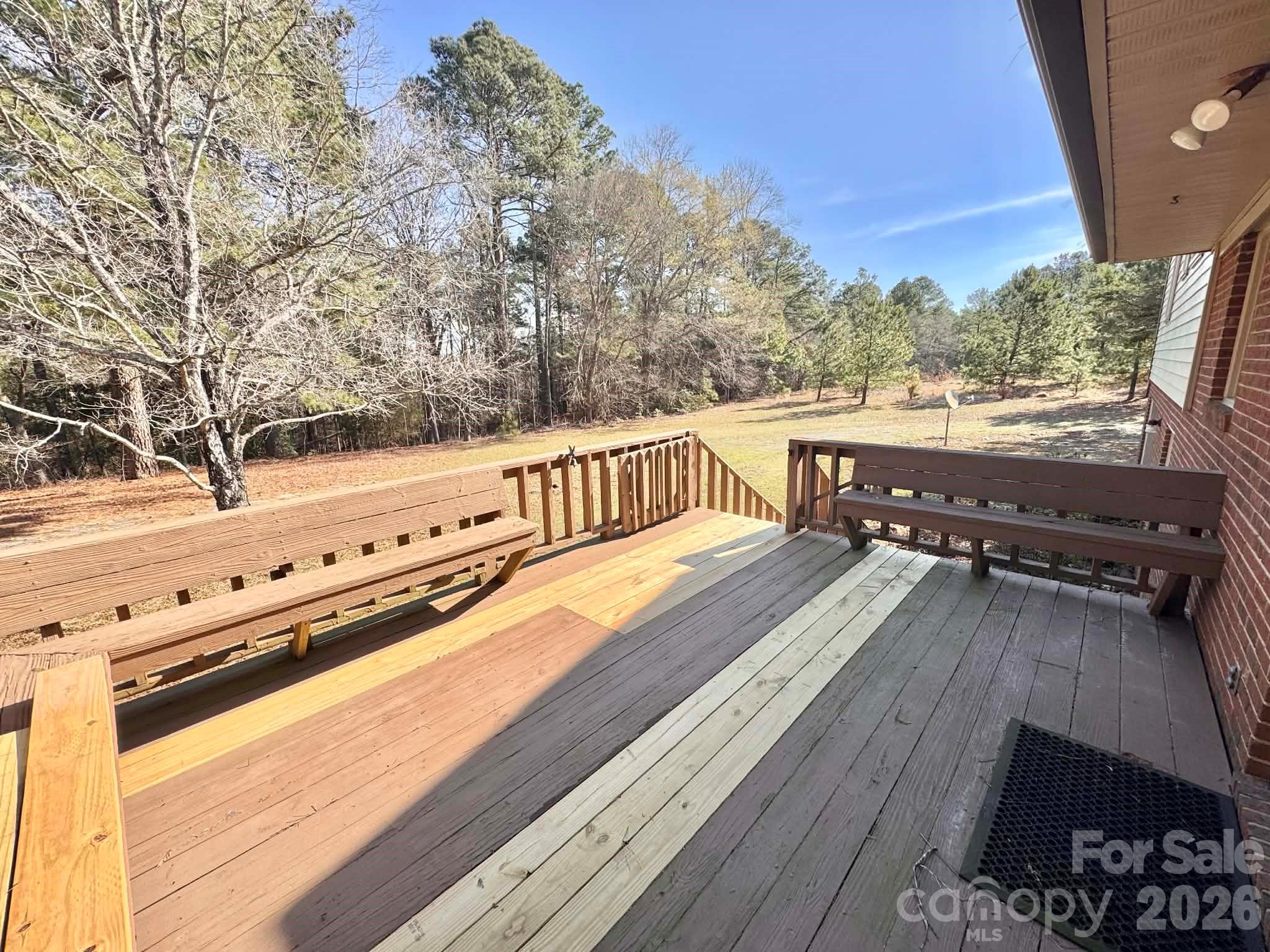 769 Dowd Road Candor, NC 27229 - Photo 32 of 32 a view of balcony with wooden floor and fence