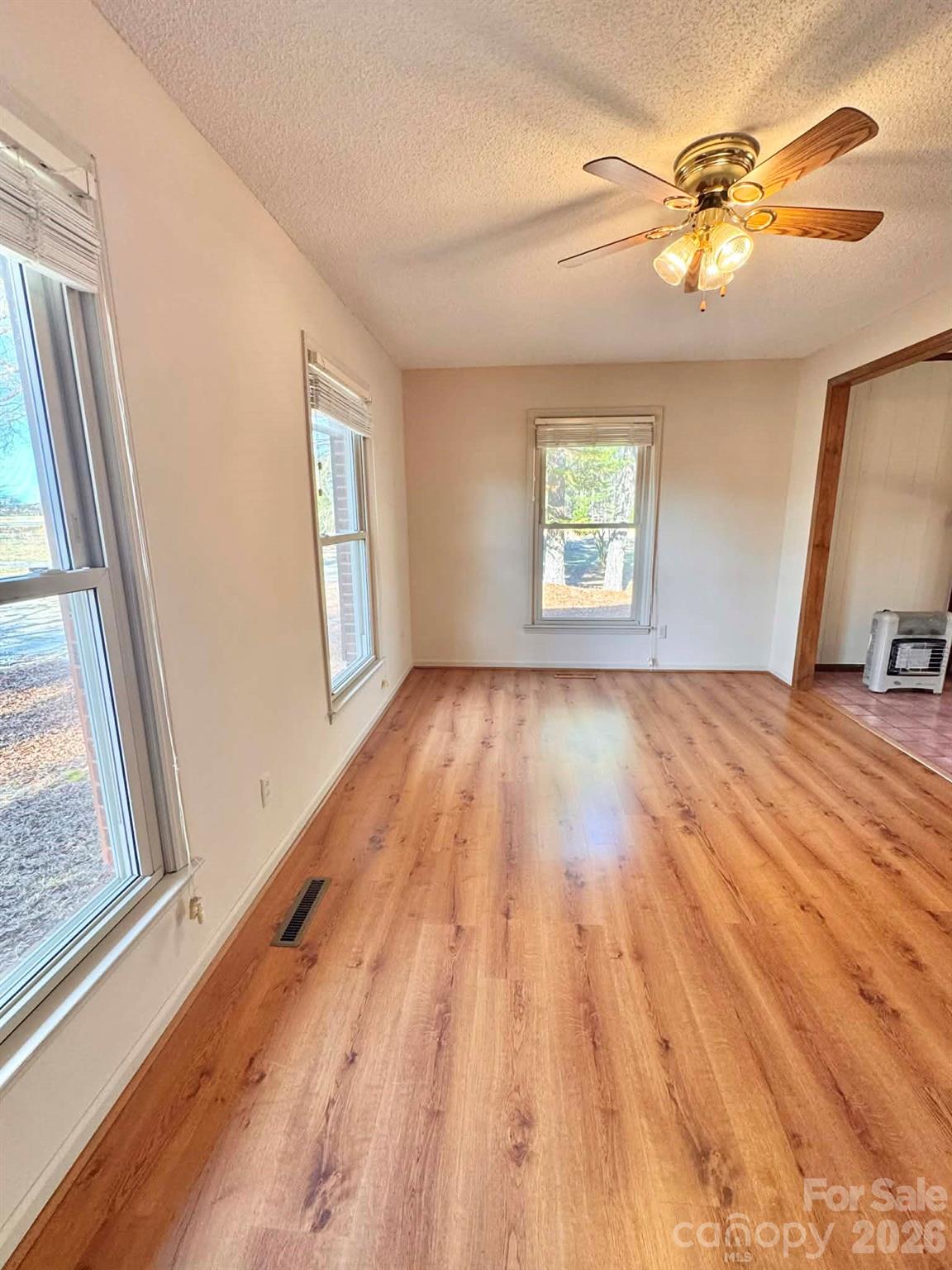 769 Dowd Road Candor, NC 27229 - Photo 4 of 32 a view of an empty room and window
