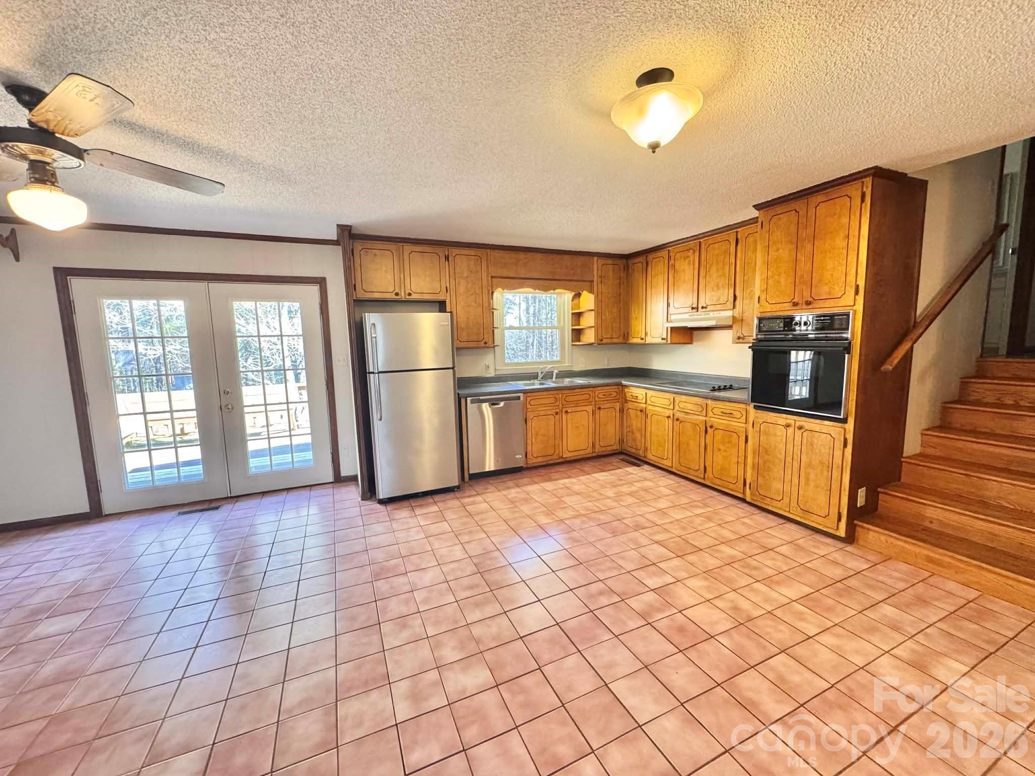 769 Dowd Road Candor, NC 27229 - Photo 7 of 32 a view of a kitchen with a sink and cabinets