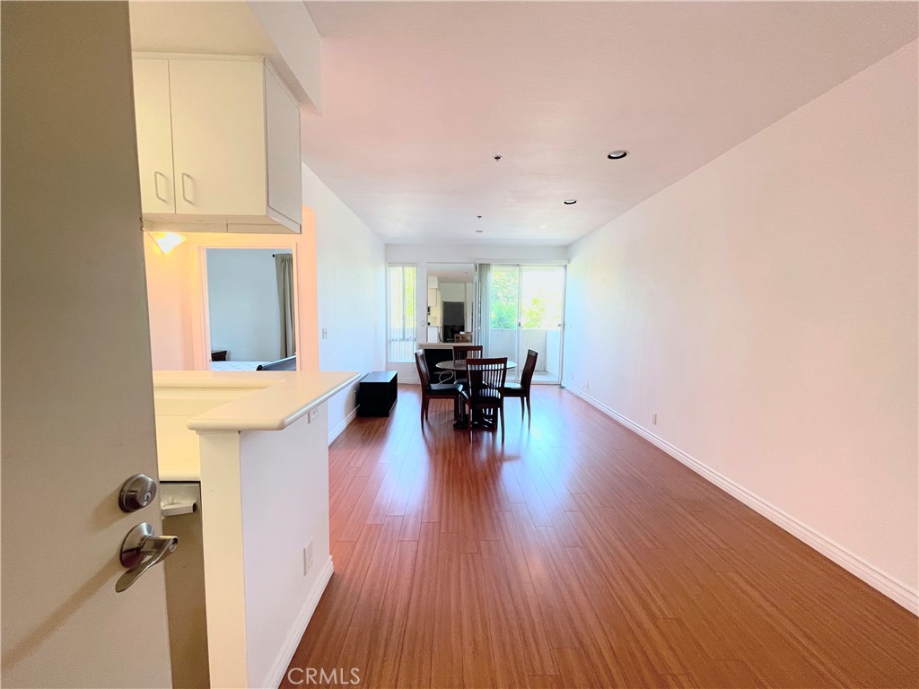 a view of a living room and dining room