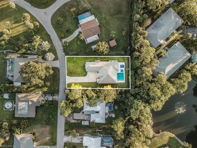 an aerial view of a house with a garden