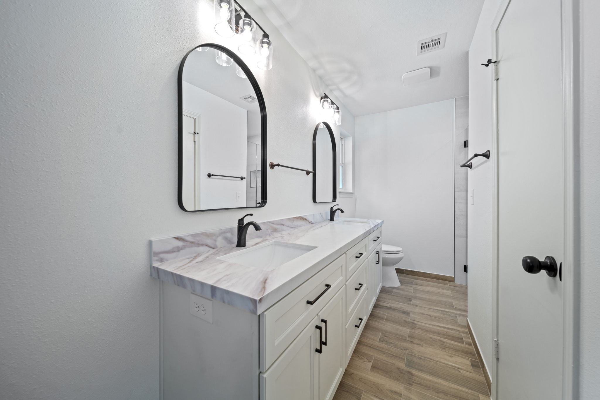 3322 Gary Lane Spring, TX 77380 - Photo 12 of 21 a bathroom with a double vanity sink and mirror