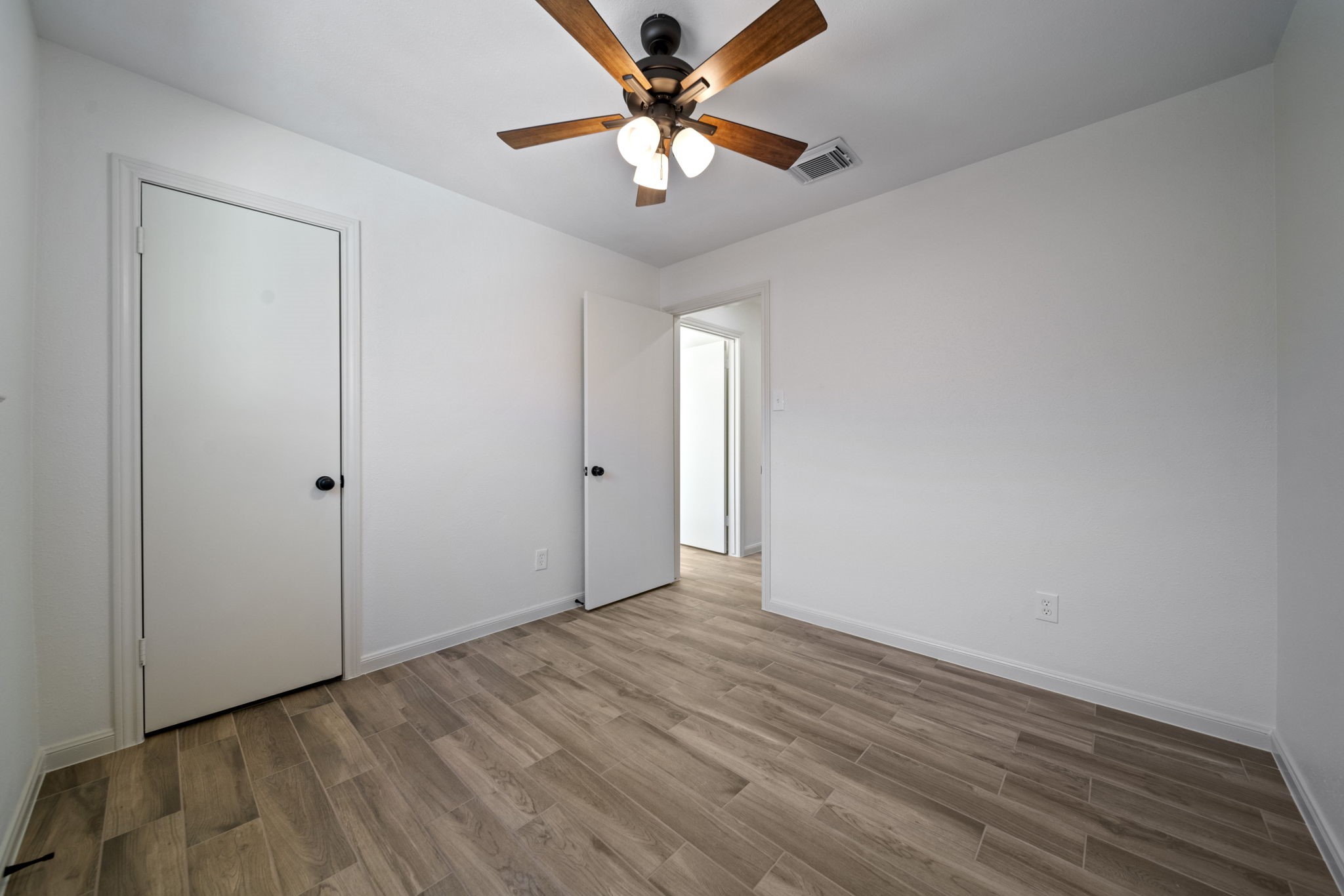3322 Gary Lane Spring, TX 77380 - Photo 15 of 21 wooden floor in an empty room