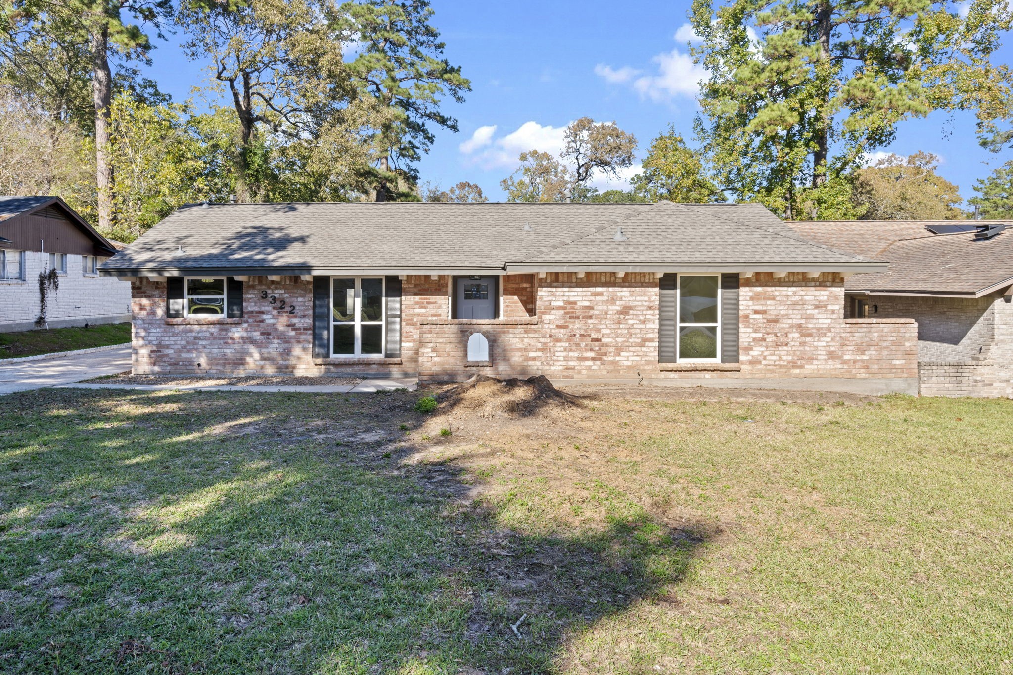 3322 Gary Lane Spring, TX 77380 - Photo 2 of 21 front view of a house with a big yard