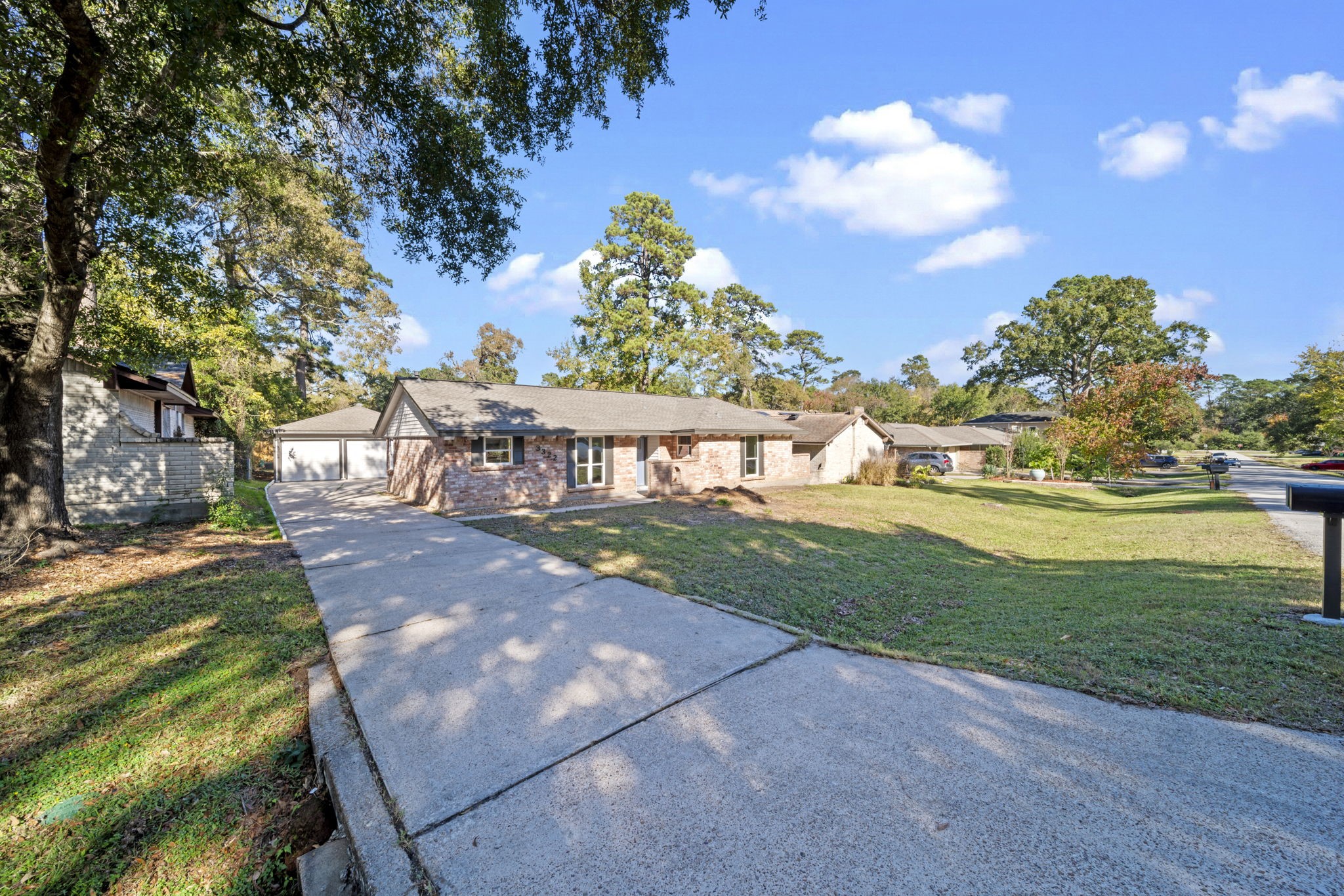 3322 Gary Lane Spring, TX 77380 - Photo 3 of 21 a view of a yard with plants and a fountain