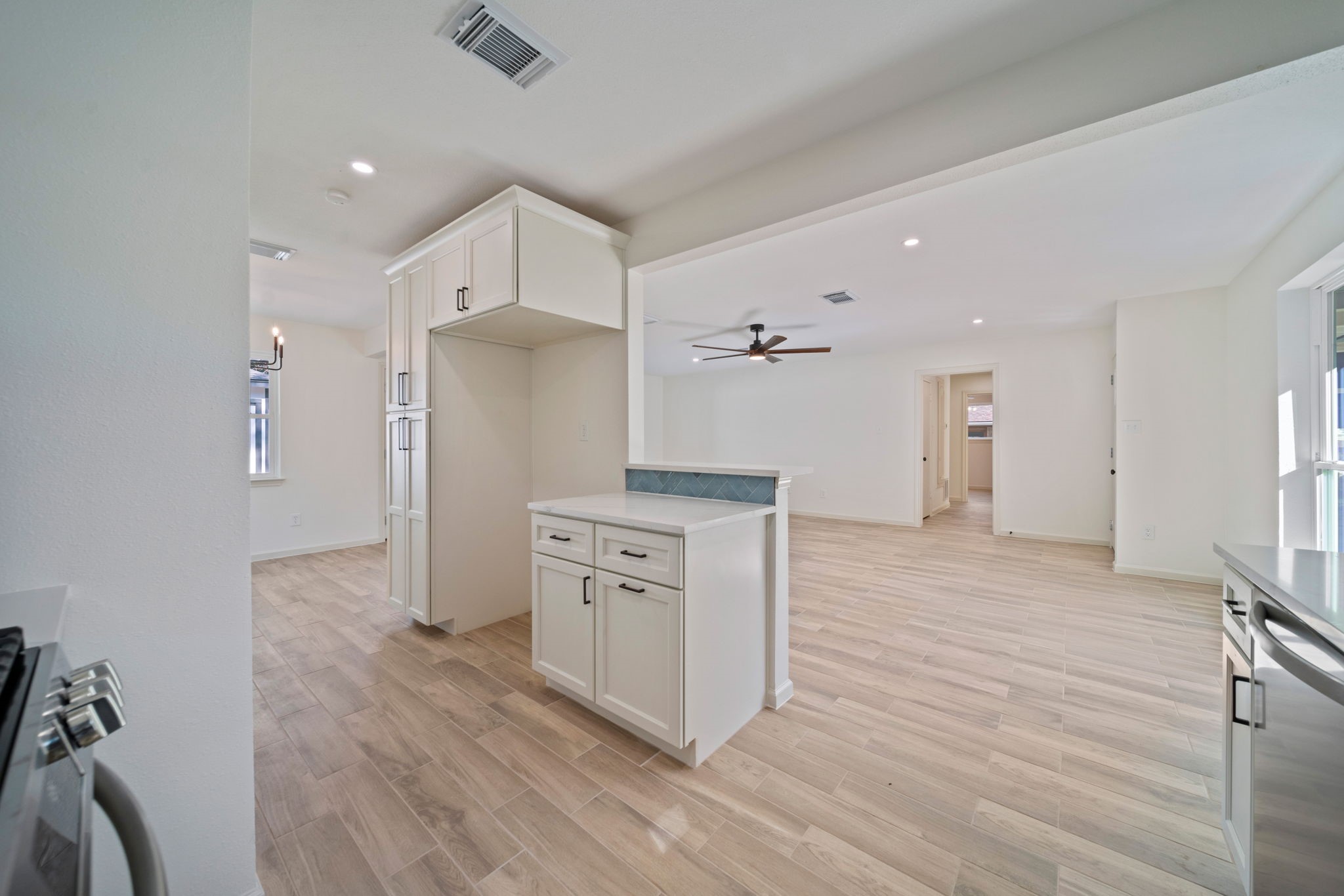 3322 Gary Lane Spring, TX 77380 - Photo 7 of 21 a kitchen with stainless steel appliances a refrigerator and a stove top oven