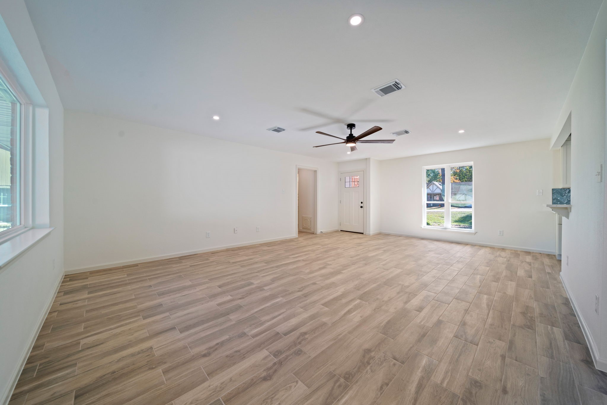 3322 Gary Lane Spring, TX 77380 - Photo 8 of 21 a view of empty room with wooden floor and fan