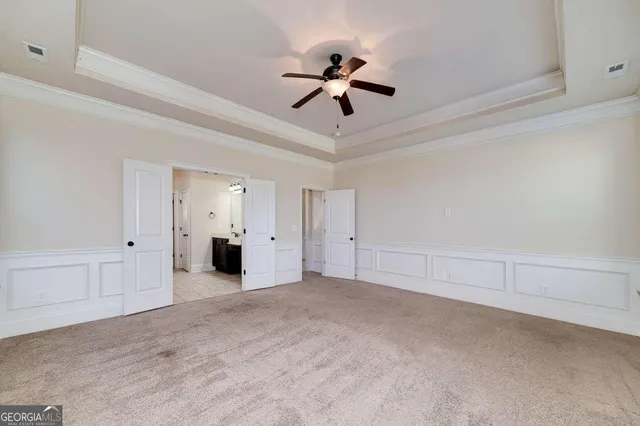 a large bathroom with a double vanity sink a mirror and a shower