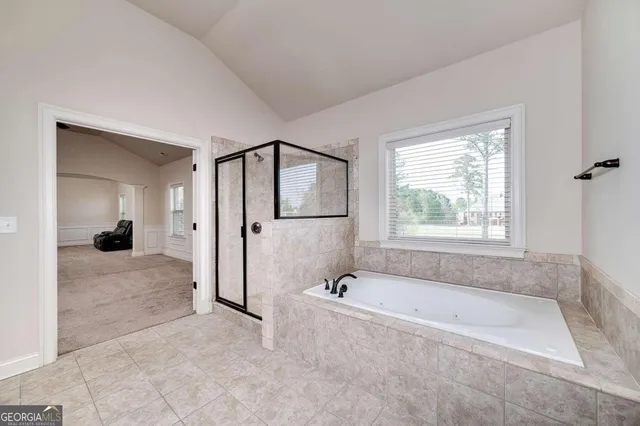 an empty room with a empty space and a ceiling fan