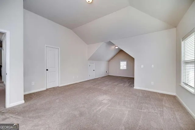 a bathroom with a granite countertop sink a mirror and a vanity