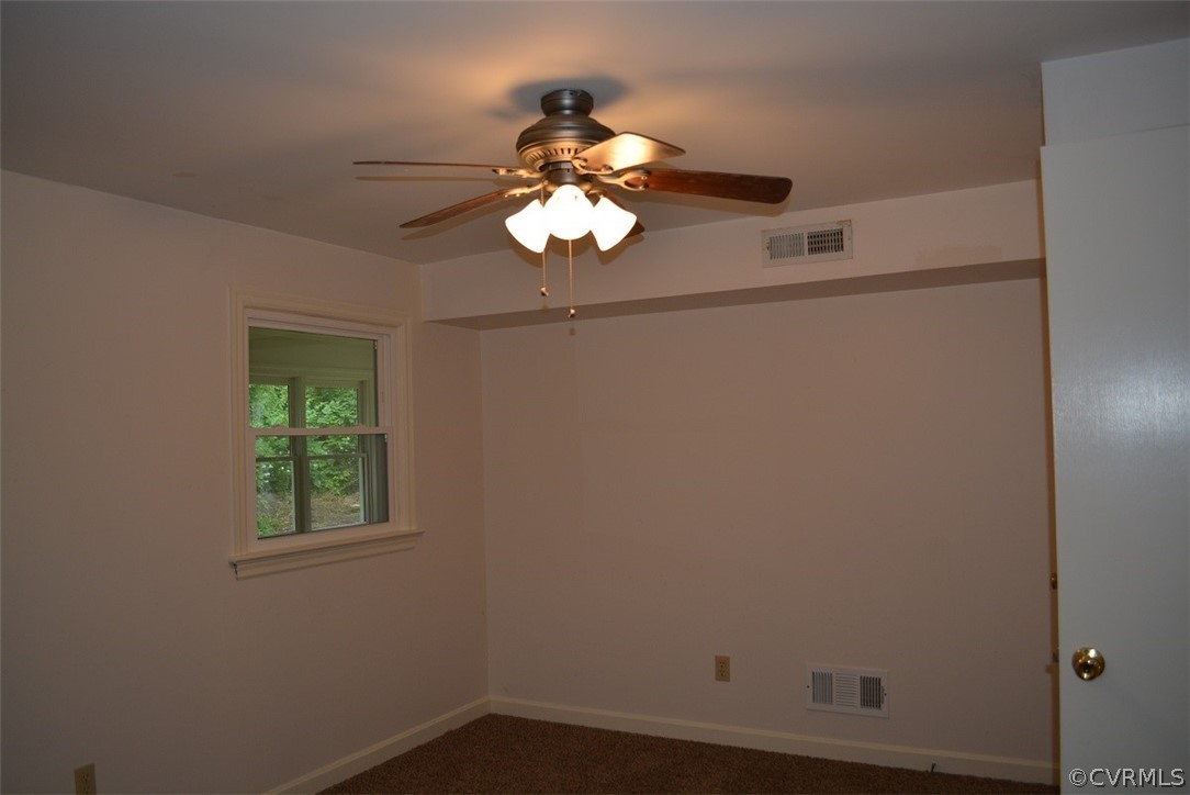 1520 Point Of Rocks Road Chester, VA 23836 - Photo 6 of 13 a window in an empty room