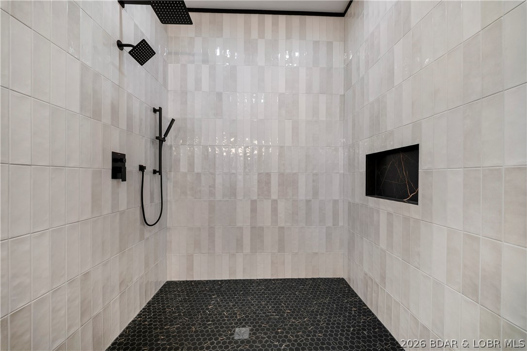 222 Red Bud Road Lake Ozark, MO 65049 - Photo 31 of 64 Oversized walk-in tile shower with designer fixtur