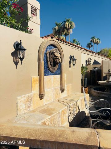 a view of swimming pool with outdoor seating and plants