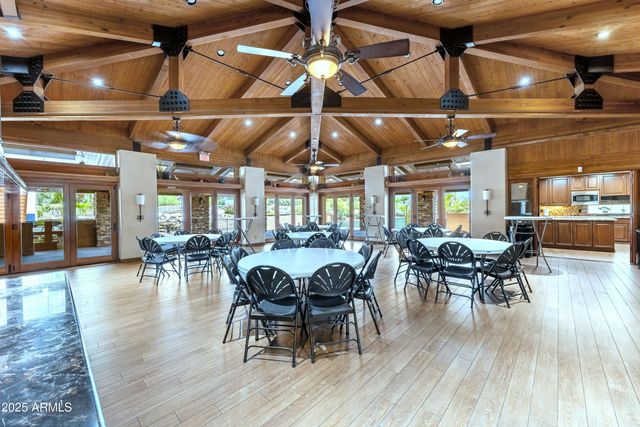 a kitchen with stainless steel appliances granite countertop wooden cabinets a sink and dishwasher