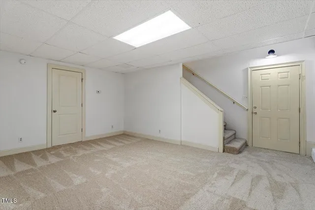 an empty room with white walls and white walls