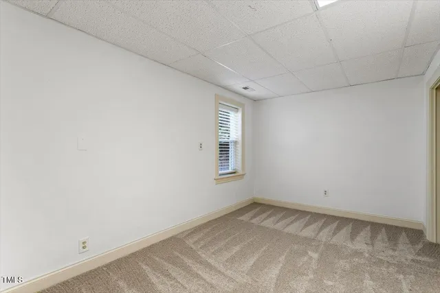 a view of a room with a window