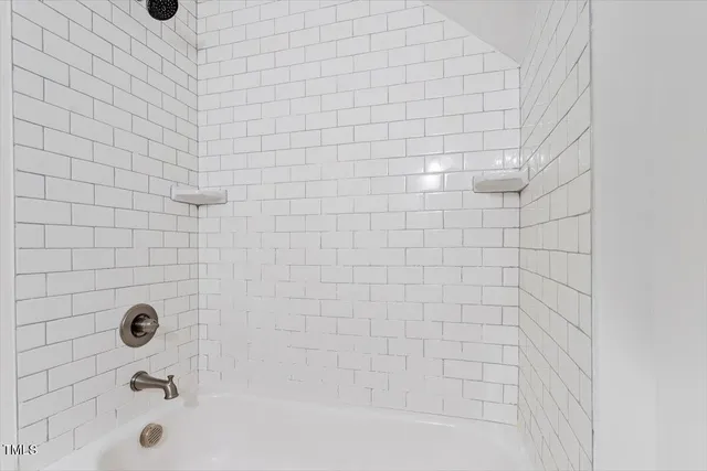 a bathroom with a bathtub