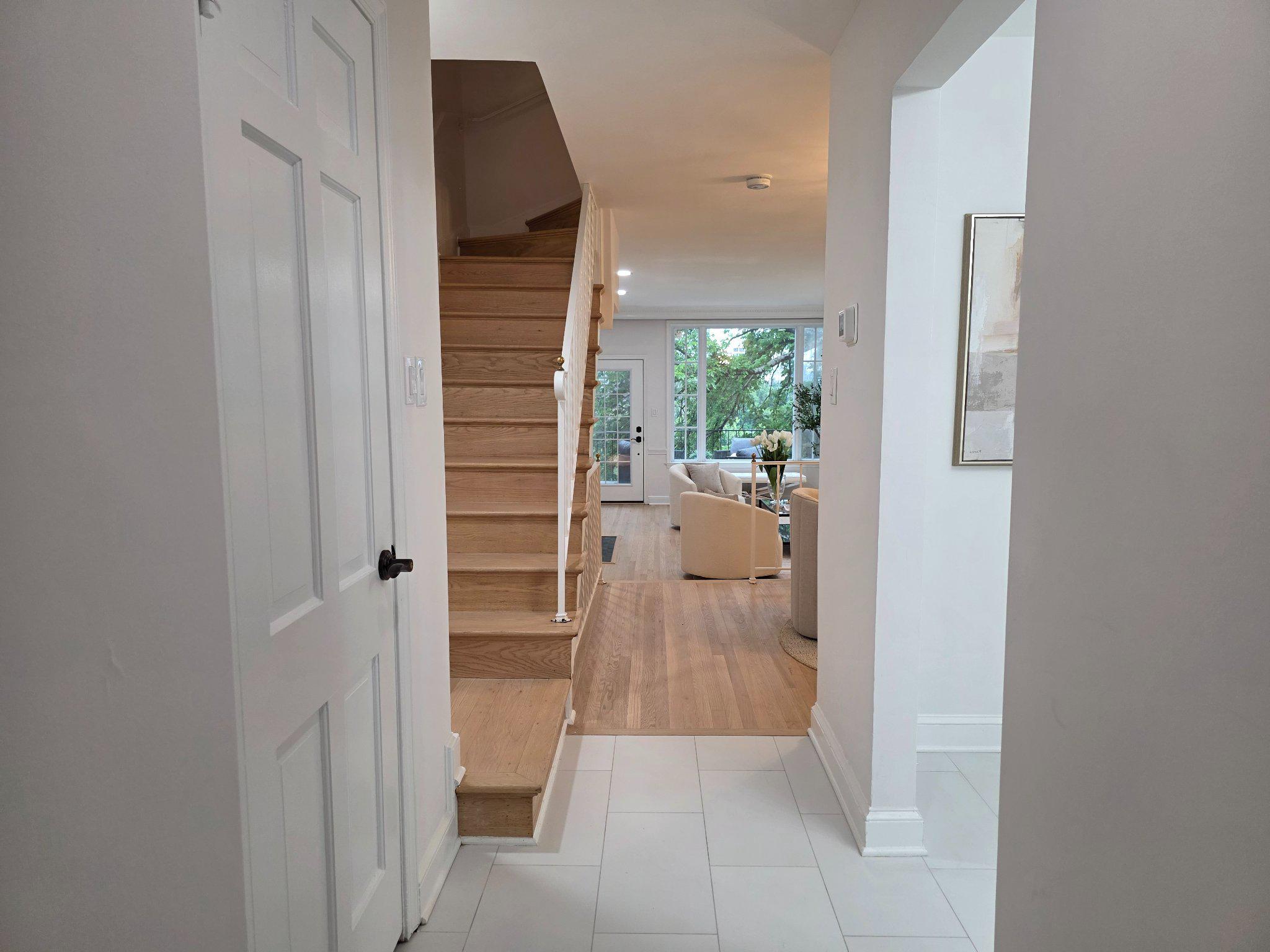 3643 St Mary's Place Northwest Washington, DC 20007 - Photo 2 of 49 a view of a hallway with wooden floor windows and entryway