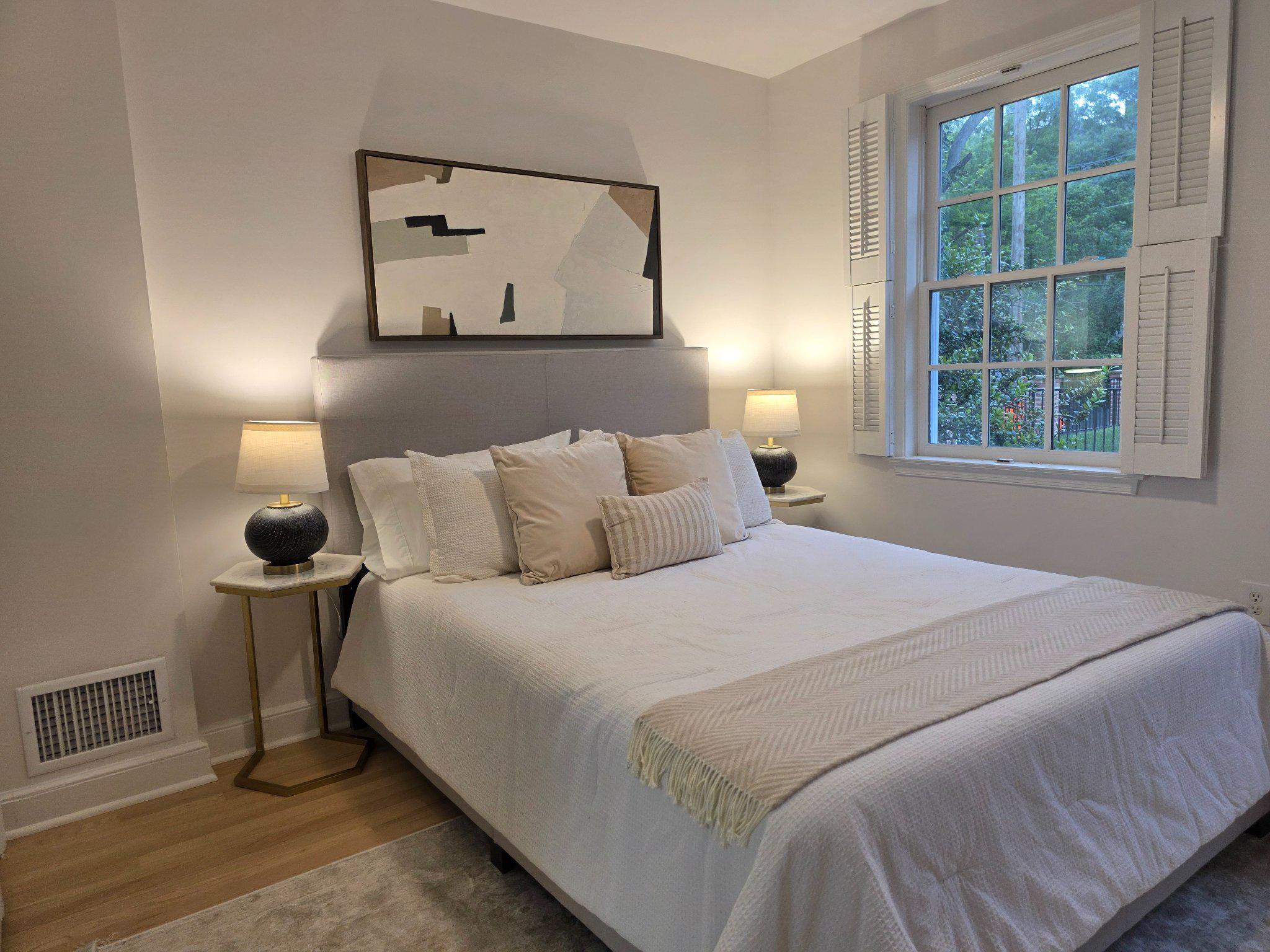 3643 St Mary's Place Northwest Washington, DC 20007 - Photo 27 of 49 a bedroom with a bed and window