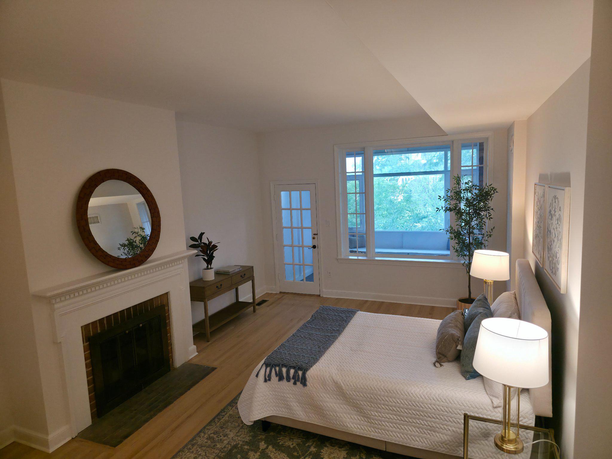 3643 St Mary's Place Northwest Washington, DC 20007 - Photo 33 of 49 a bedroom with furniture and a fireplace