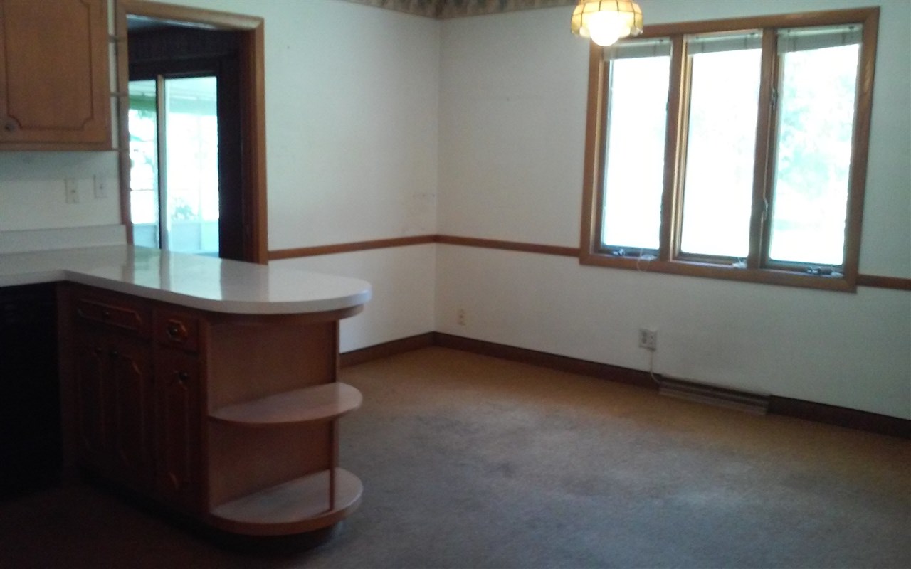 5035 Welsh Road Rockford, IL 61107 - Photo 10 of 15 a view of an empty room with a window