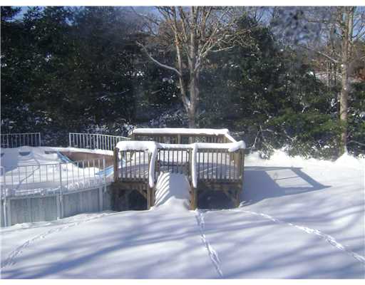 9 Airport Road Coventry, RI 02816 - Photo 9 of 9 Exterior Back. Nice Deck with Above Ground Pool. Pool needs new lining.