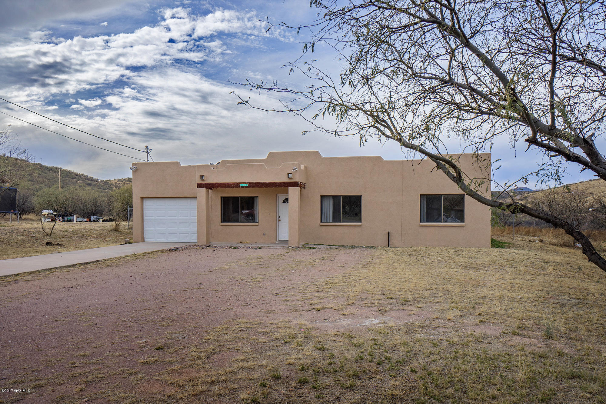 1308 Calle Cherokee Rio Rico, AZ 85648 - Photo 1 of 15 a house with a outdoor space