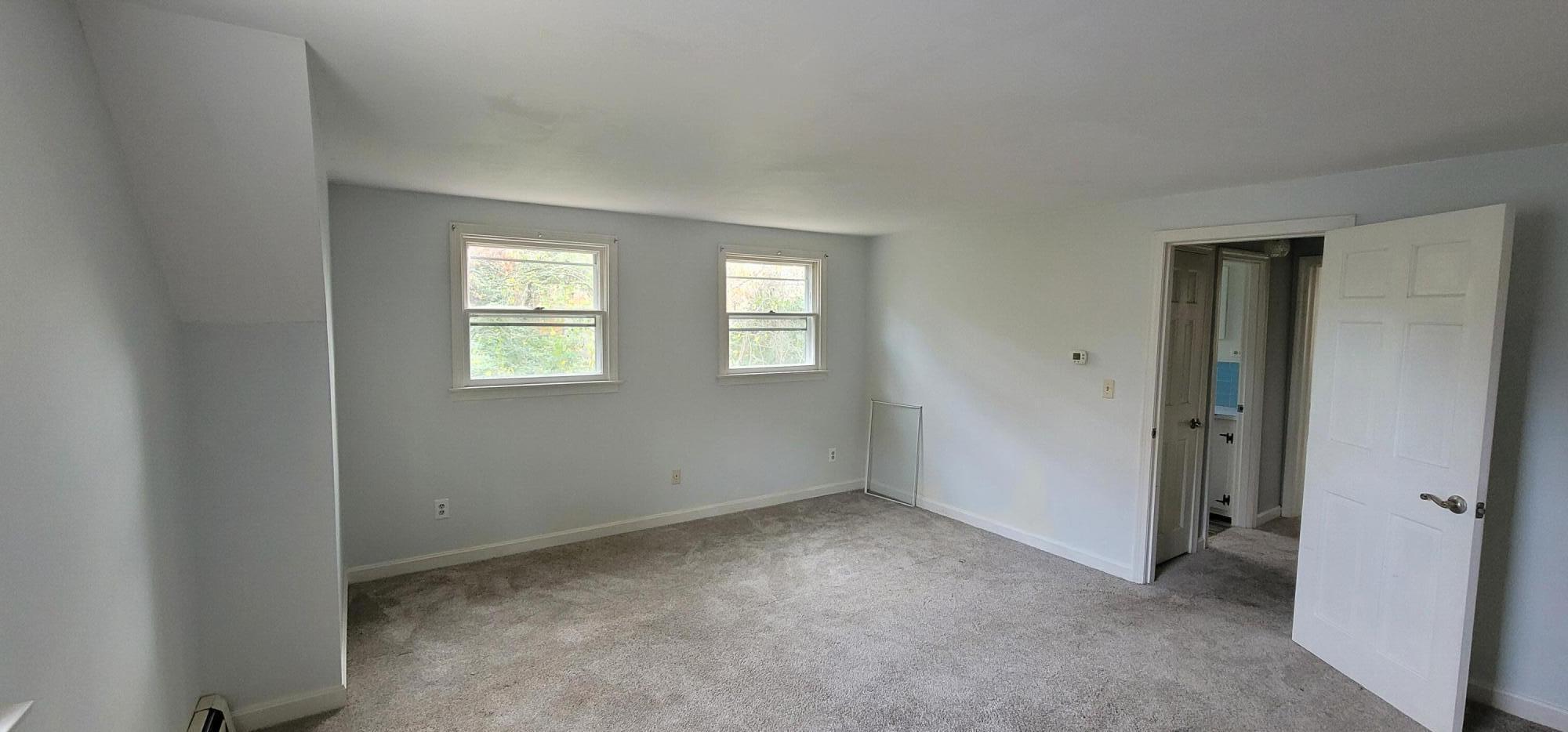 79 Emerson Way Centerville, MA 02632 - Photo 11 of 13 an empty room with windows