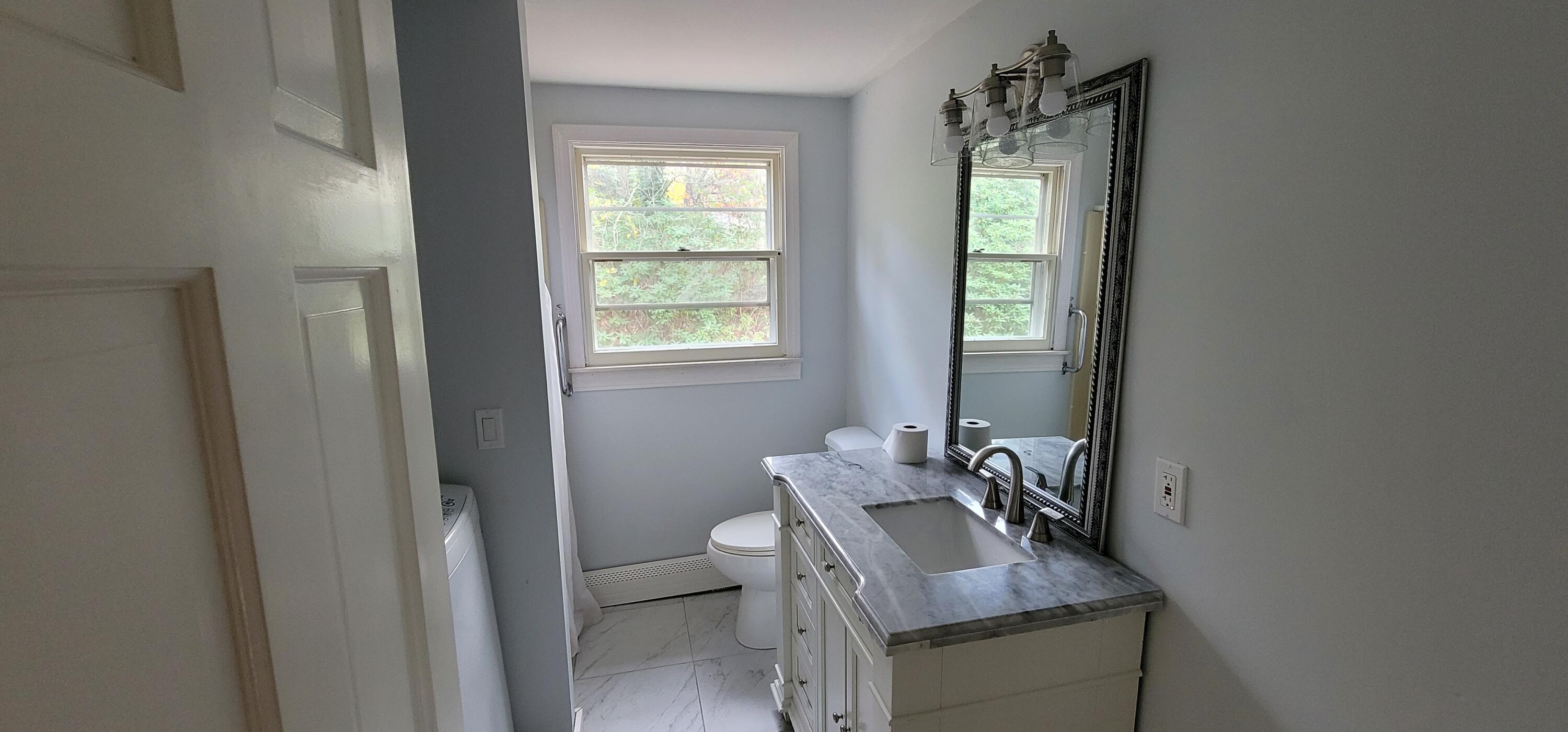 79 Emerson Way Centerville, MA 02632 - Photo 8 of 13 a bathroom with a sink toilet and window