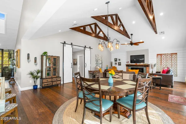 a view of a livingroom with furniture window and wooden floor