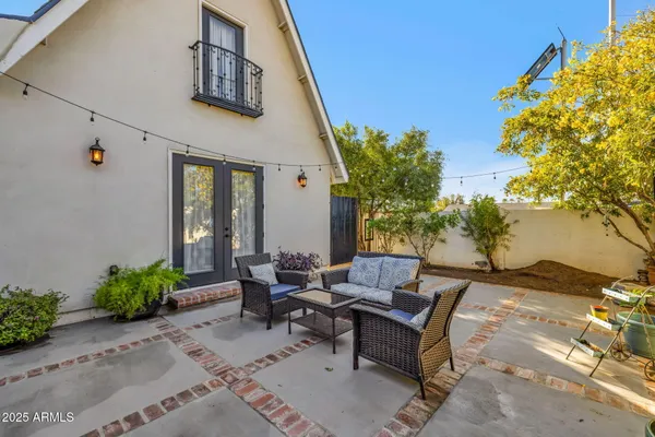 a building outdoor space with patio furniture