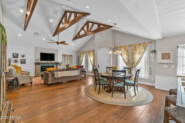 a work room with furniture and wooden floor
