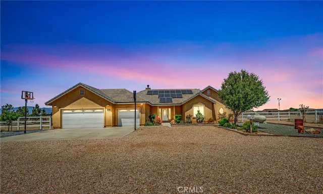 a view of a backyard of a house