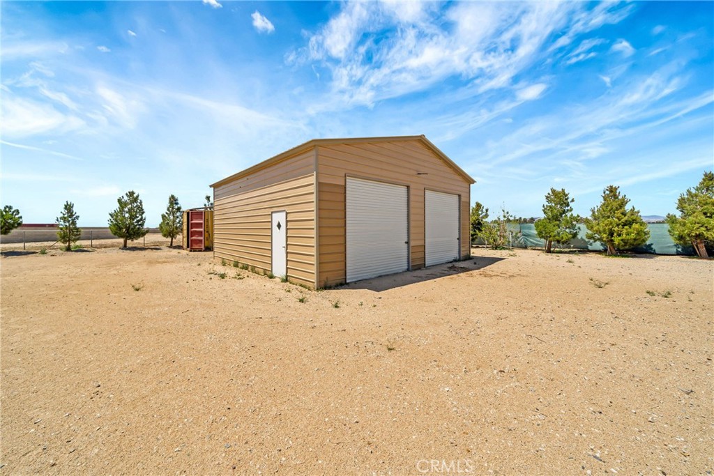 7315 West Ave A 8 Lancaster, CA 93536 - Photo 5 of 65 a view of a backyard of a house