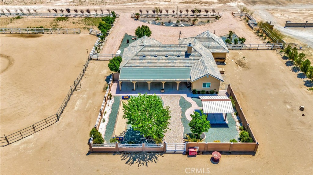 7315 West Ave A 8 Lancaster, CA 93536 - Photo 61 of 65 an aerial view of a house with a yard and lake view