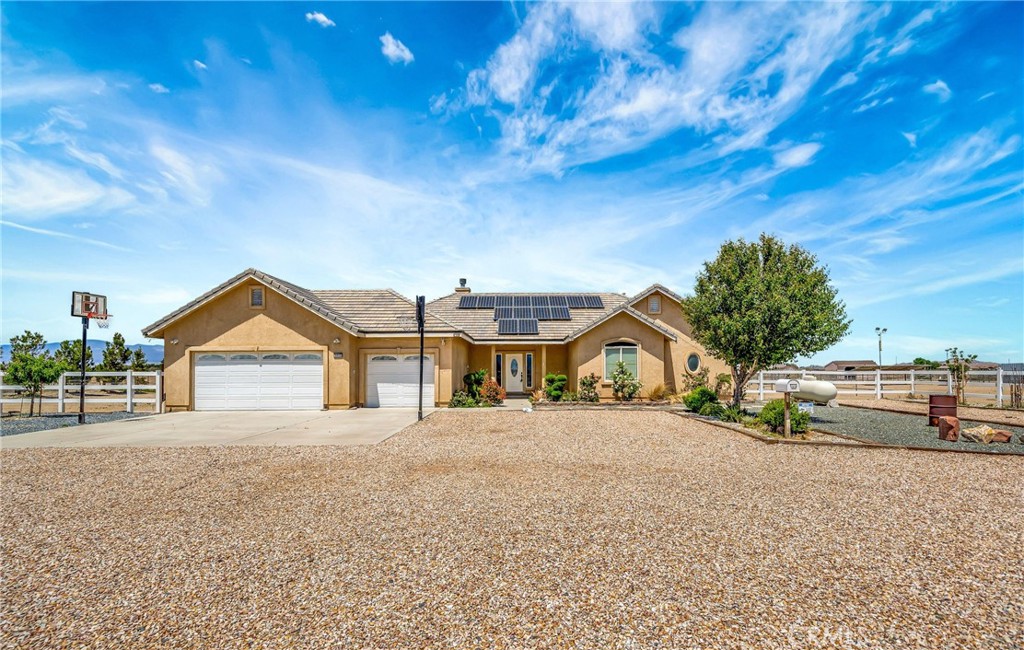 7315 West Ave A 8 Lancaster, CA 93536 - Photo 7 of 65 a view of a house with a yard