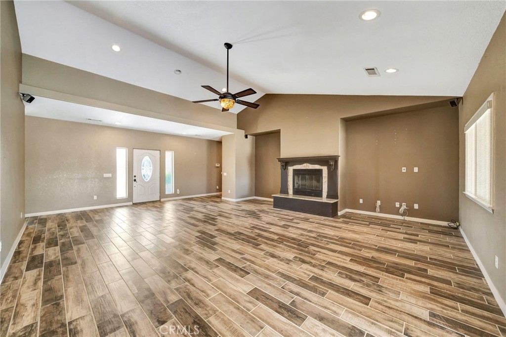 7315 West Ave A 8 Lancaster, CA 93536 - Photo 9 of 65 a view of an empty room with window and fire place