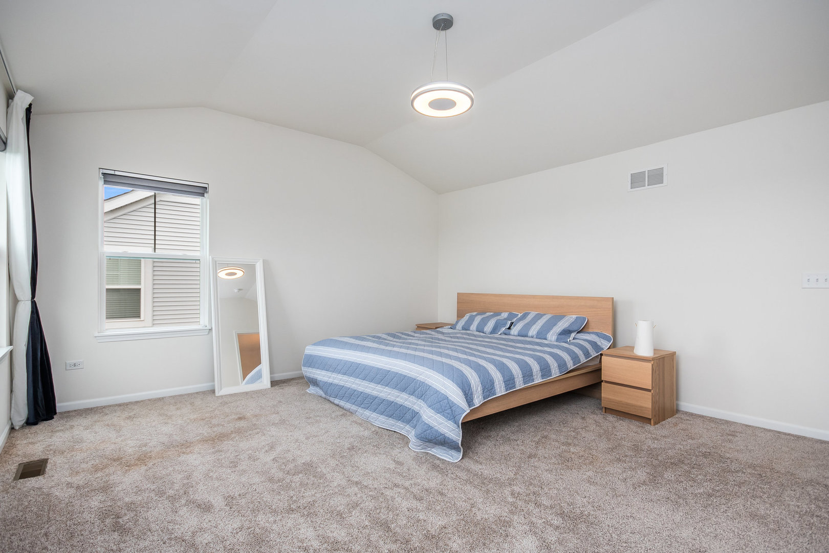 4166 Calder Lane Aurora, IL 60504 - Photo 12 of 30 a living room with a bed furniture and a window