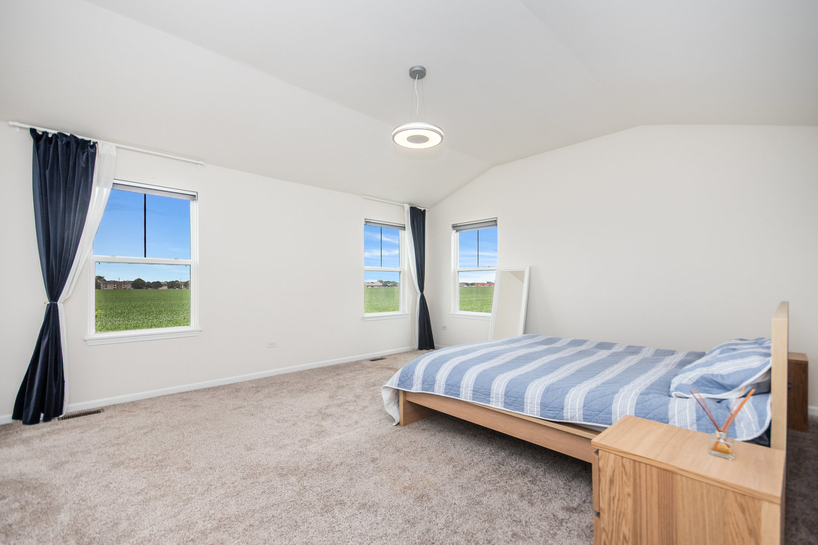 4166 Calder Lane Aurora, IL 60504 - Photo 13 of 30 a bedroom with a bed and a window